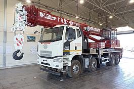 КС 55721-7В-1 Комсомолец автокран 35 т. (FAW-3310) ОВАЛОИД колесная формула 8х4